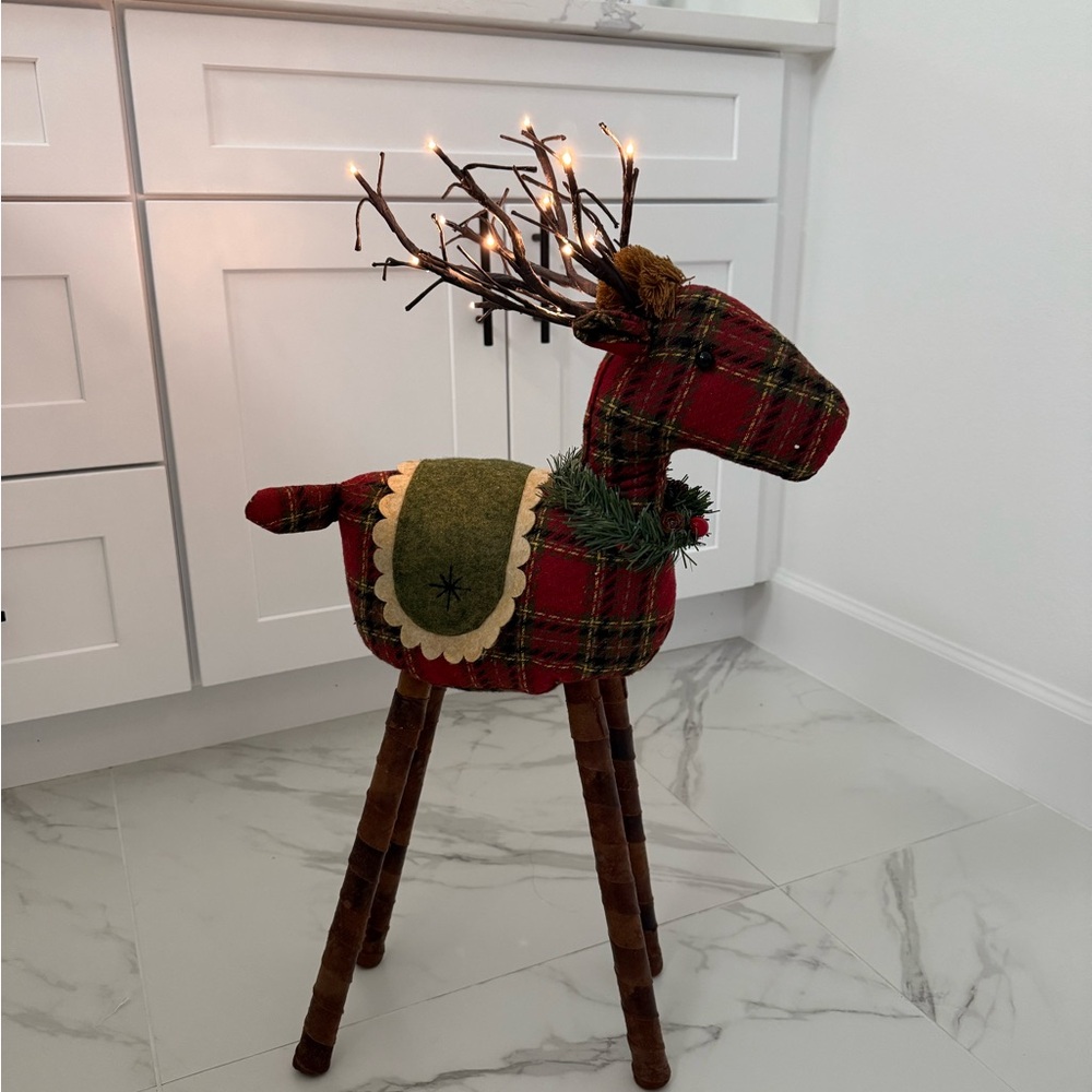Plaid Holiday Reindeer with lit antlers.